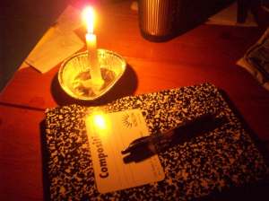 notebook in candlelight